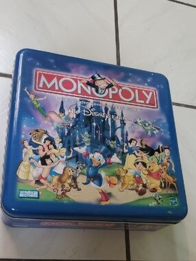 Brand new unique "Monopoly The Disney Edition" Board Game - Tin Blue box